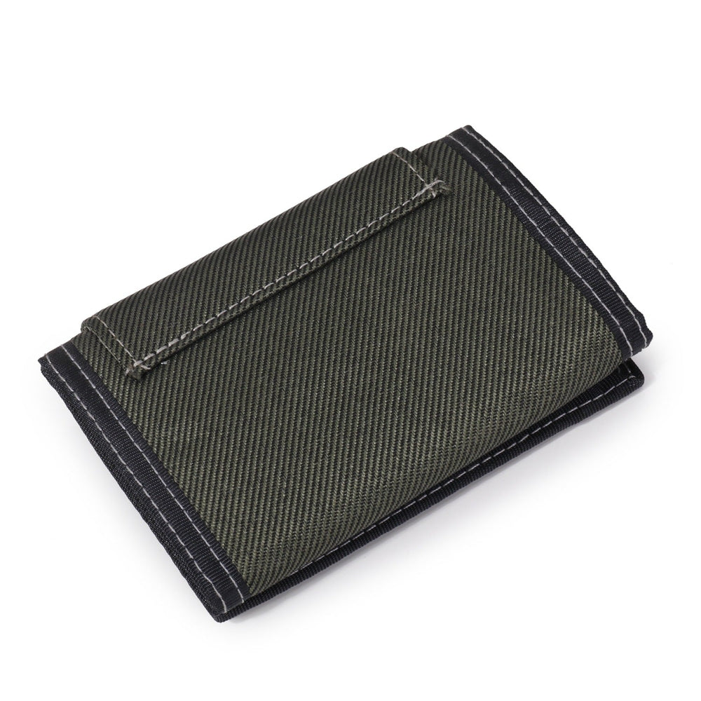 Porte monnaie en tissu avec écusson en métal - Le Classique™