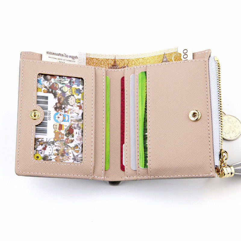 Portefeuille fin en simili cuir avec pompon - Le Classique™
